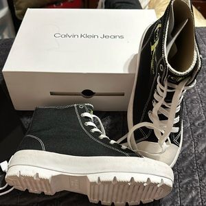Calvin Klein high top sneakers.  Gesina